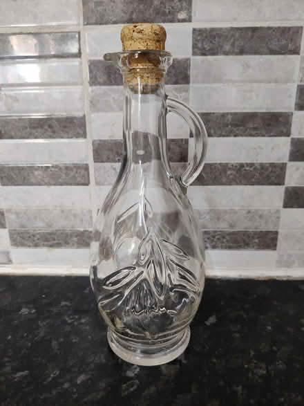 Photo of free Empty glass olive oil (SW18) #1