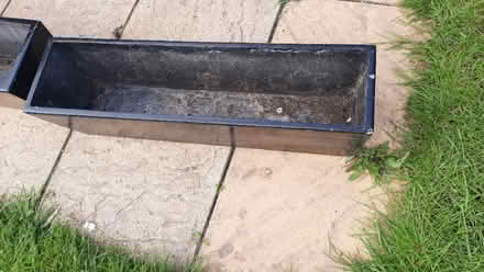 Photo of free Pair of black gloss fibreglass planters (Emmbrook RG41) #3
