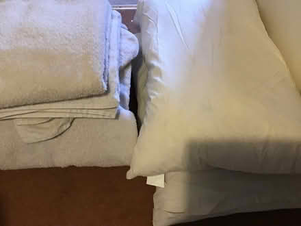 Photo of free Used white bath towels and feather pillows (Chiswick Ground W4) #1