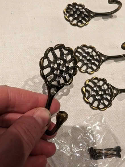 Photo of free Bronze & diamanté curtain hooks (Southhouse EH17) #2