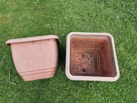 Photo of free 2 terracotta look plastic tubs (Enborne Row RG14) #1