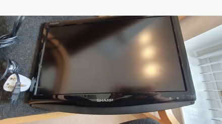 Photo of free Small flat screen tv and wall mount (TA1) #1