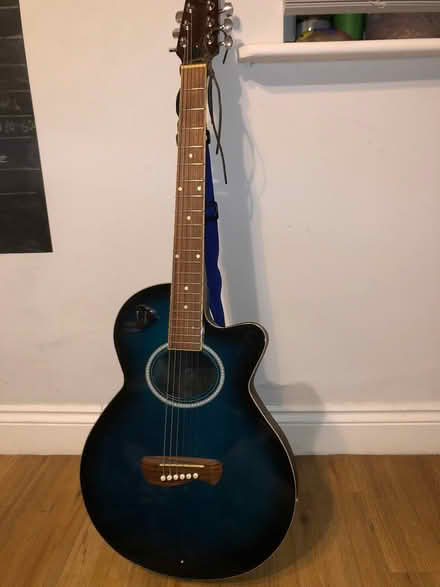 Photo of free Blue Acoustic Guitar (WR5 London Road) #1