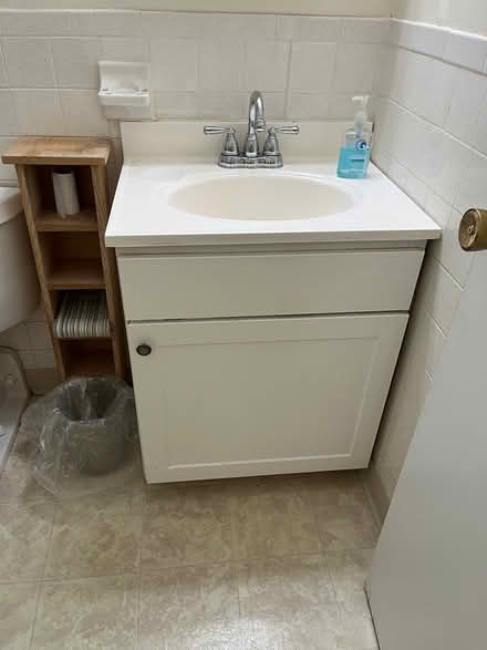 Photo of free 24” bathroom vanity, sink, faucet (Watertown square) #1