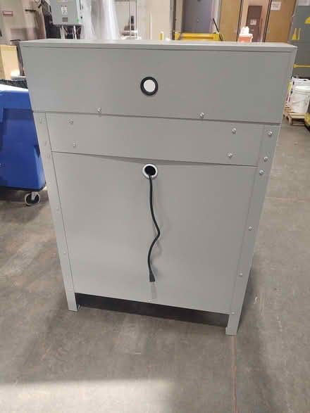 Photo of free Metal Cabinet with built in outlet (Fremont)