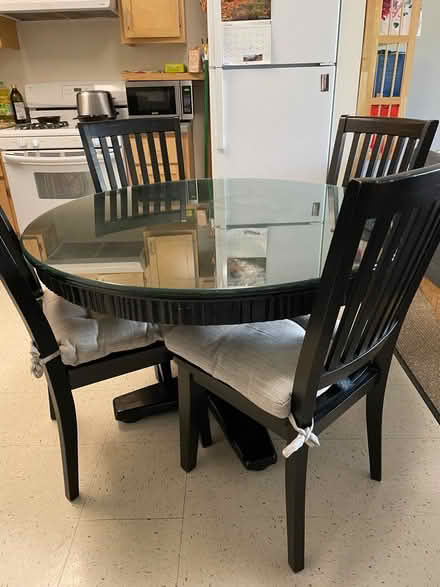 Photo of free Solid wood round table and 4 chairs (Albany, CA)