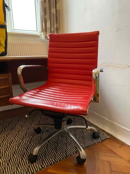 Photo of free Red wheeled desk chair (by Clissold Park N16) #1