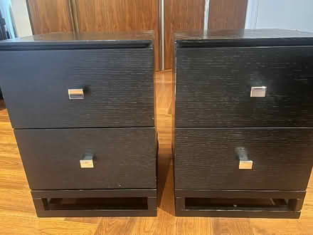 Photo of free Two black wooden bedside tables (Nine Elms SW11) #1