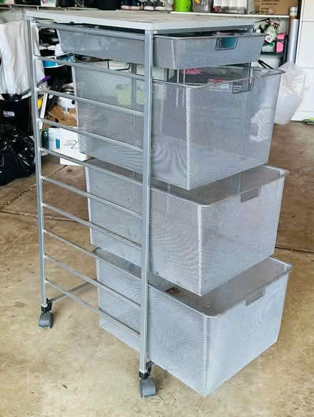 Photo of free Metal shelving unit on wheels (South Wheaton) #1