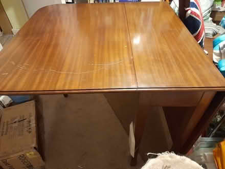 Photo of free Leaf dining table, solid dark wood (Rochdale OL12) #1