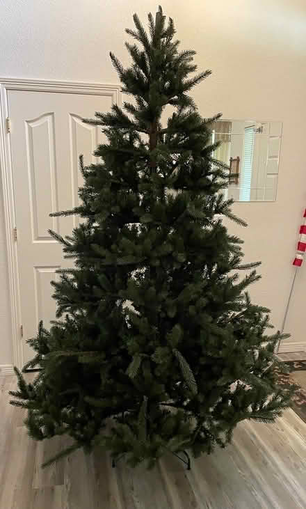 Photo of free 7.5 ft artificial xmas tree (unlit) (Near 115th & Sheridan) #1