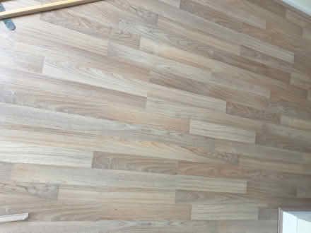 Photo of free Light teak laminate flooring. Approx 12 m2. (Fishers Green SG1) #1