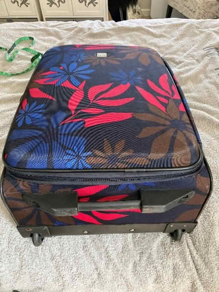 Photo of free Tripp 25” suitcase (Spalding PE11) #1