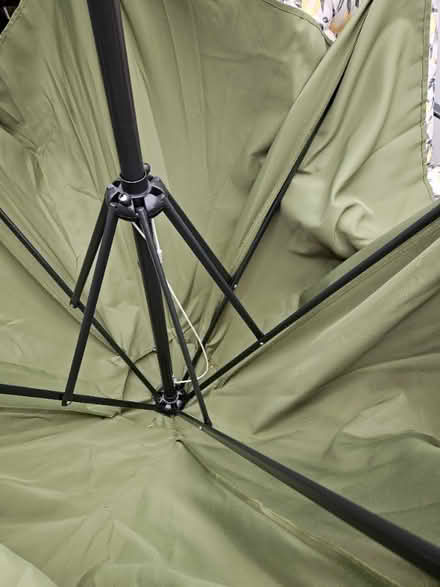 Photo of free Large garden brolly, faded but still life in it. Both poles base (Binley CV3) #1