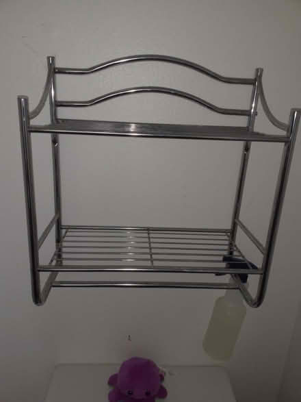 Photo of free Metal Wall shelf (Wonderland Neighborhood) #1