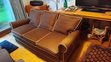 Photo of free Sofa. Small three-seater (West Wimbledon) #2