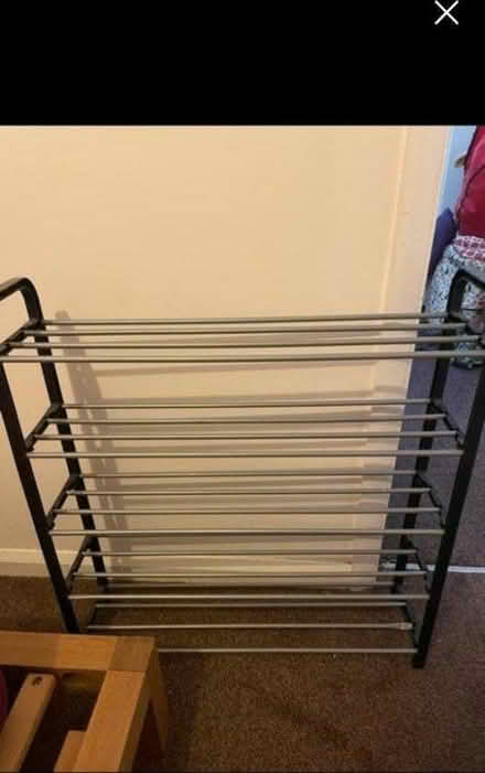 Photo of free 4 tier plastic shoe rack • used (Clapham Common) #1