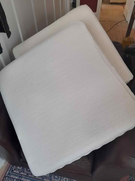 Photo of free 2 cream sofa base cushions (Llandudno, South Shore.) #1