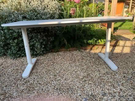 Photo of free White laminate desk 1400 x 600mm (Palmer Park RG1) #1