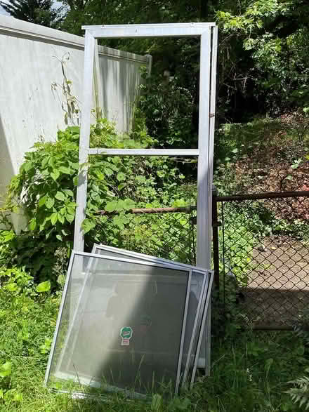 Photo of free Aluminum storm door frame (20910) #1