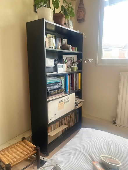 Photo of free Black bookcase (HP6) #1
