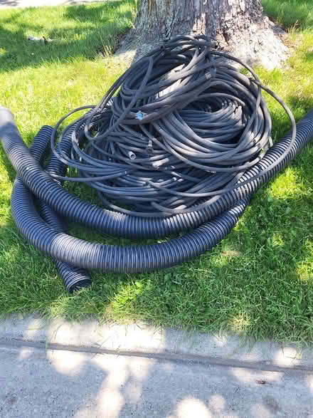 Photo of free Used soaking rubberized hoses (Westchester, Il) #1