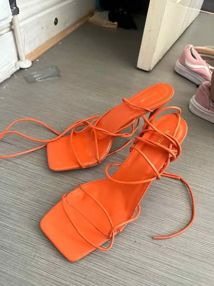 Photo of free Orange strap up heel (HA0) #1