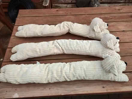 Photo of free 3 draught excluders (Cowplain) #1