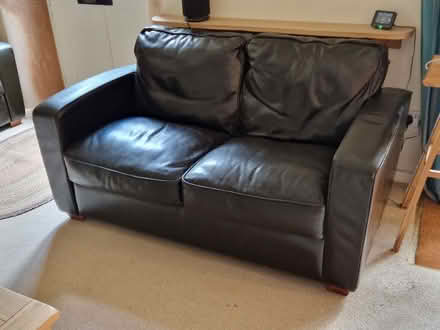 Photo of free Leather sofa and chair. (Ducklington OX29) #1