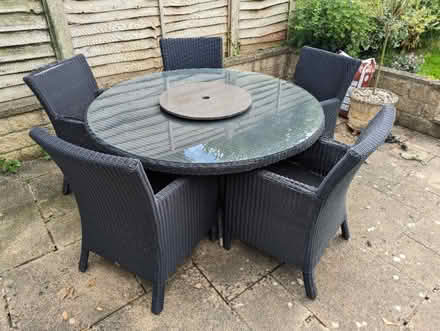 Photo of free Large wicker patio table, chairs and parasol (Kempshott RG22) #1