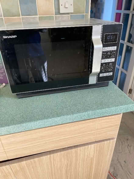 Photo of free Sharp microwave- flat bed design (Oswestry SY11) #1