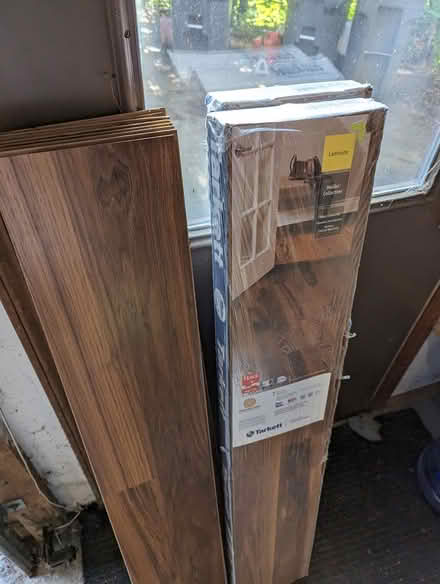 Photo of free 50 sq ft laminate flooring (Brighton, MI)