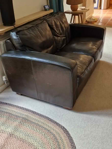 Photo of free Leather sofa and chair. (Ducklington OX29) #2