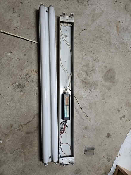 Photo of free Fluorescent light fixtures 4' long (Britannia & Winston Churchill) #1