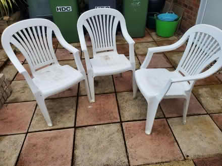 Photo of free 3 White plastic garden chairs (Huntingdon) #1