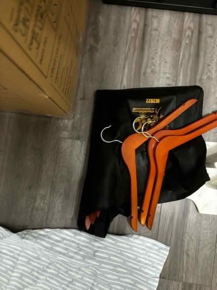 Photo of free Wooden coat hangers (Herndon/Elden Street) #1