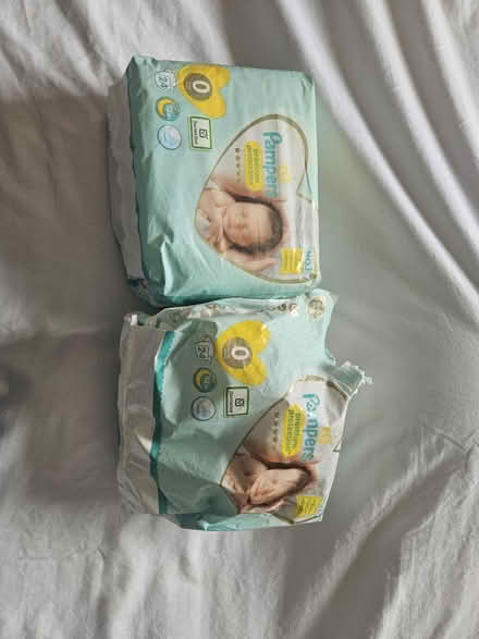 Photo of free 2 packs nappies size 0 (Reading RG1) #1