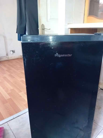 Photo of free black under counter fridge (bolton BL5)