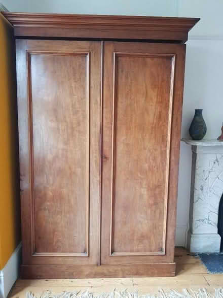 Photo of free hardwood wardrobe (Oxton CH43) #1