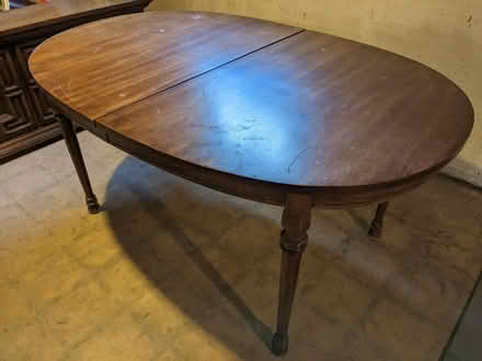 Photo of free Dining room table with extensions (Norwood Park) #1