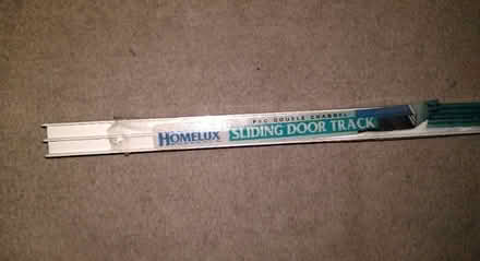 Photo of free PVC double channel sliding door track (Cotham BS6) #1