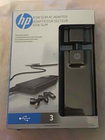 Photo of free HP 65W Slim AC Adapter (Simsbury, Off Bushy Hill Road) #1