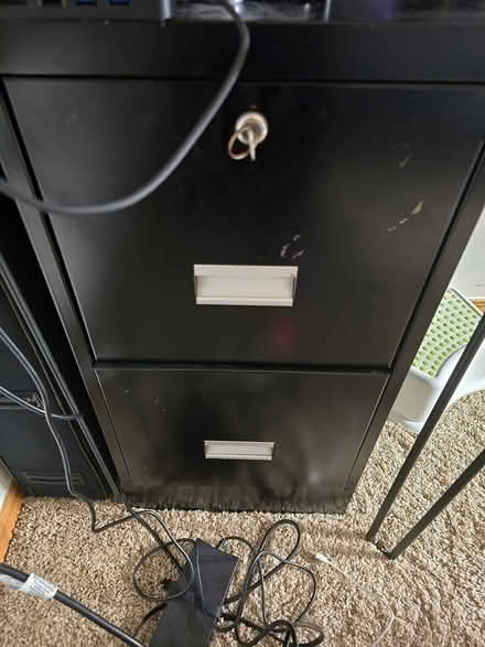 Photo of free Black filing cabinet with key (licton springs) #1