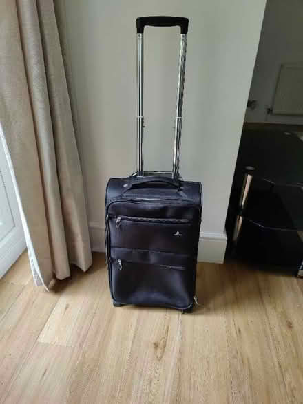 Photo of free Carry-on suitcase with wheels and extending handle (Oaklands nr Welwyn AL6) #1