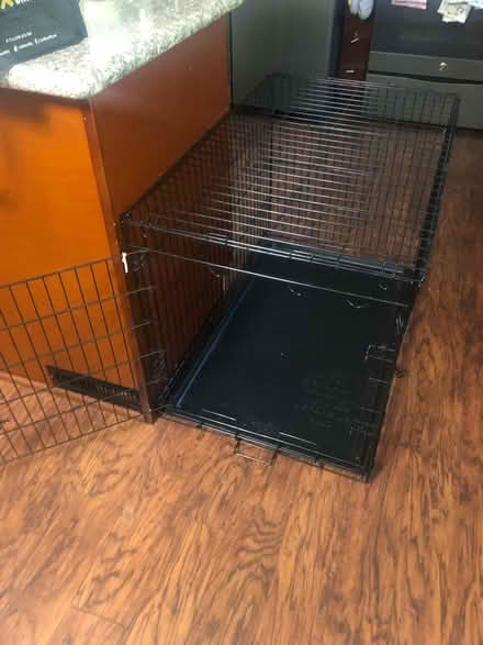 Photo of free Med/Large Dog Crate (Frederick, md) #1