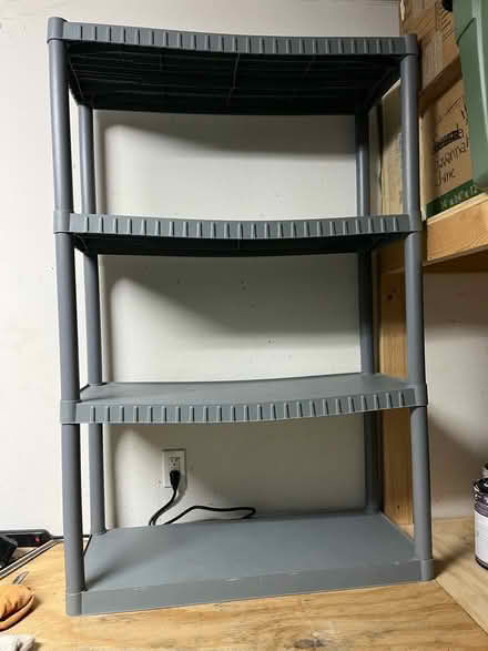 Photo of free Grey Plastic Shelving Unit (Westchase Fl) #1