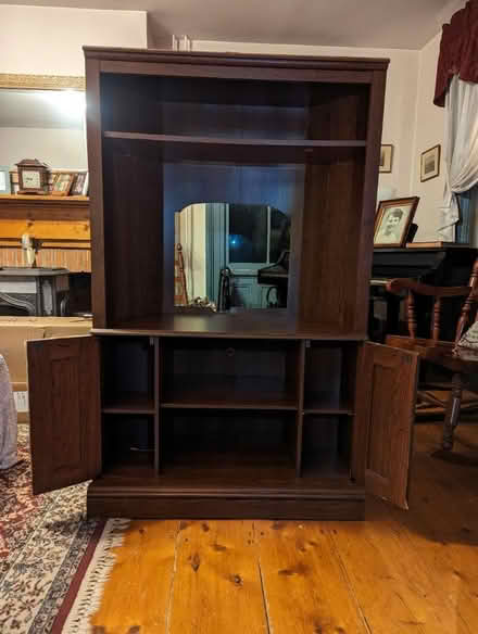 Photo of free Corner TV entertainment center (Near Arlington HS) #1