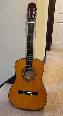Photo of free 3/4 size nylon-string guitar (Charlton OX12) #1