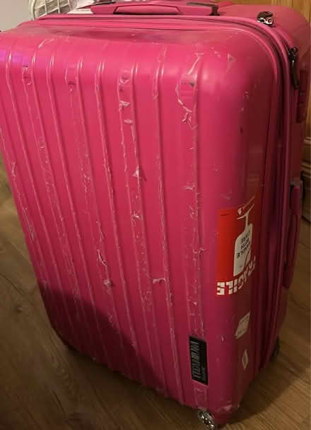Photo of free Pink suitcase- broken wheels (S10) #1