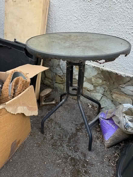 Photo of free small glass patio table (BH9 Moordown) #1